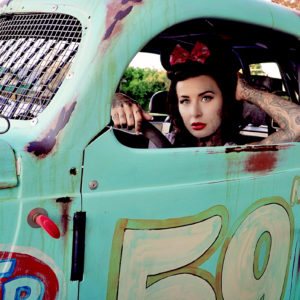 Photo of Pin Up Model in Car